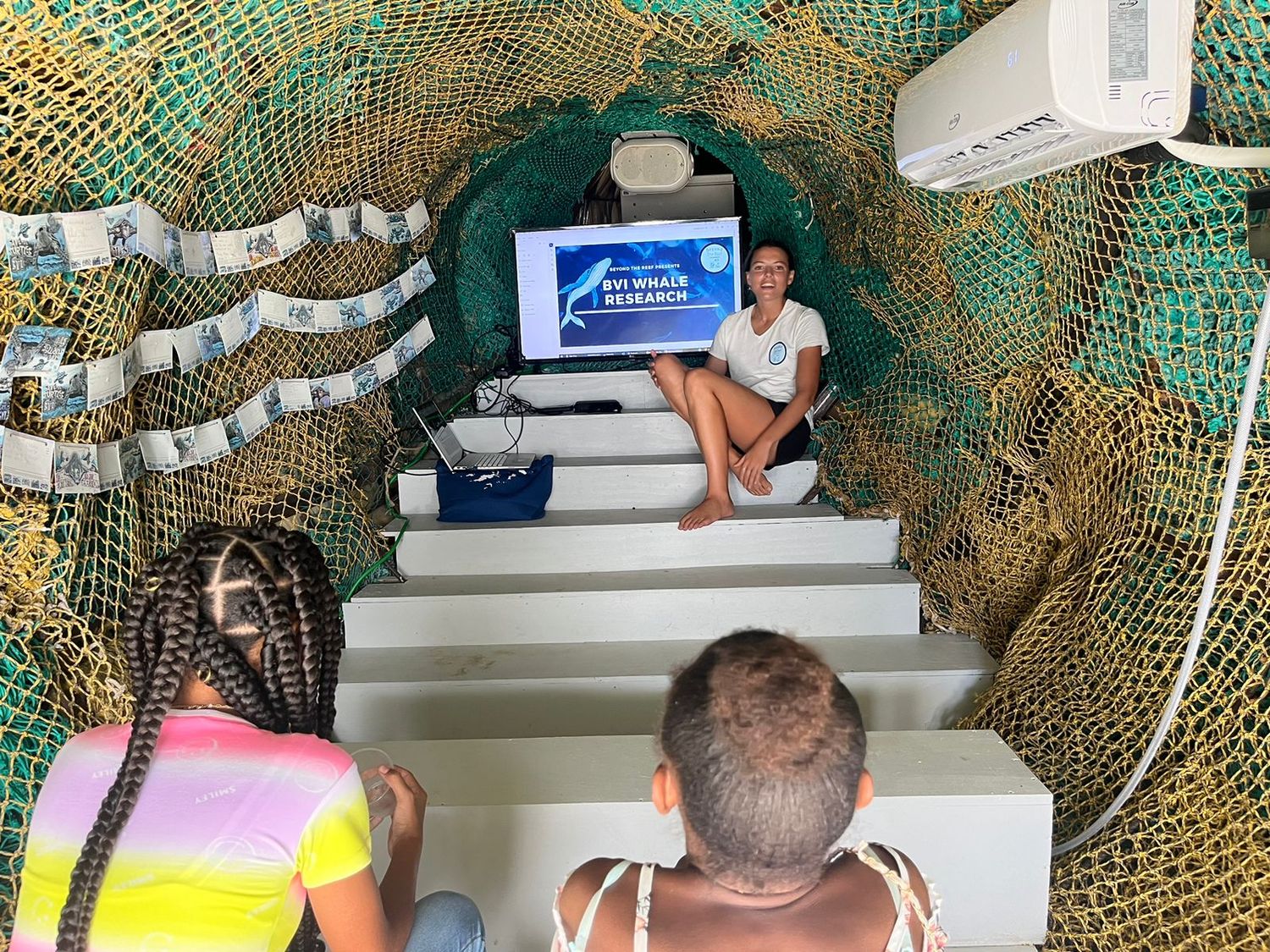 Kendyl Berna presenting BVI whale research to local students