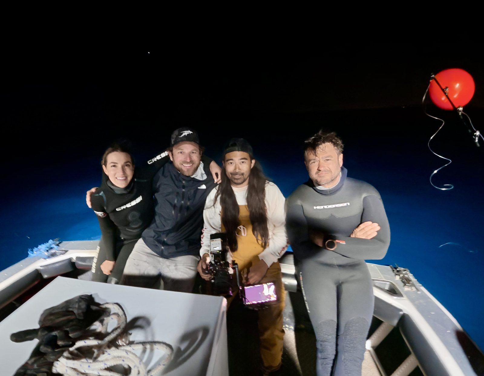 Kendyl Berna with the dive crew on a night shoot