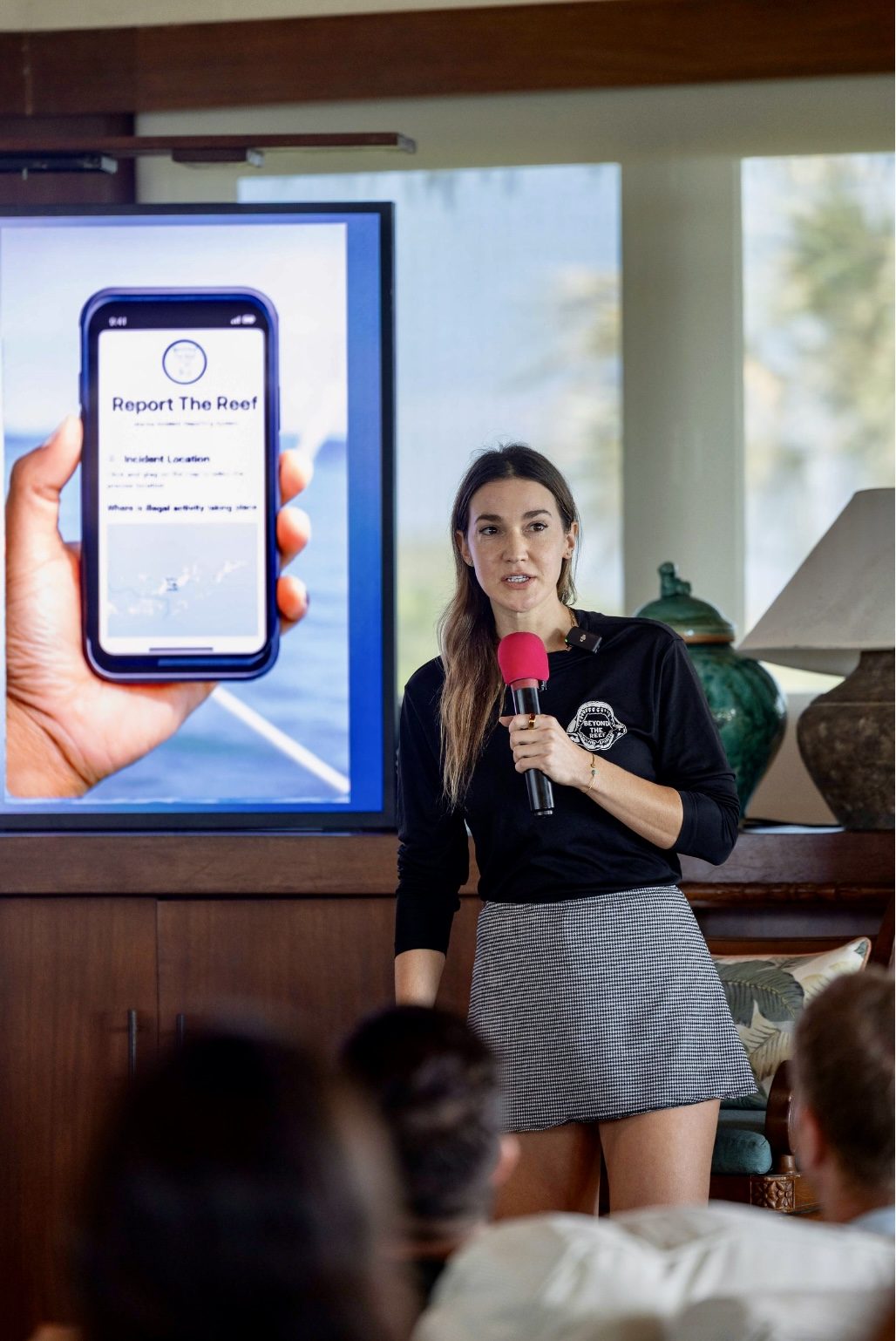 Kendyl Berna presenting Report The Reef on Necker Island